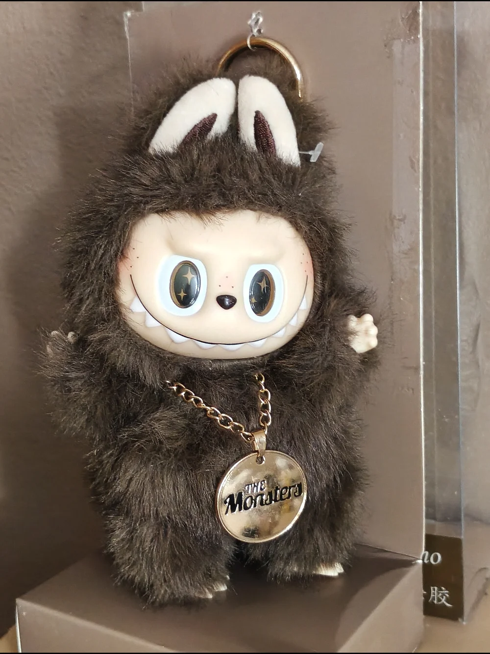#248 Fuzzy Knock Off Monster Keychain with Gold Pendant